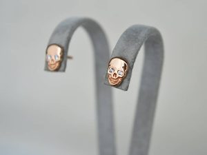 Auksiniai auskarai - kaukolės